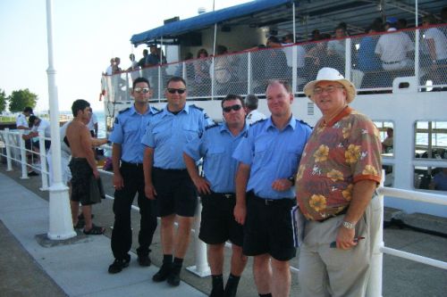 Right to left Jim Snyder, Imperial Oil representative, Jamie Kerwin, PointSAR unit leader and crew members James MacQuaid, Jason Bosker and Mike Derlis in front of the Duc D´Orleans docked along the Sarnia waterfront.